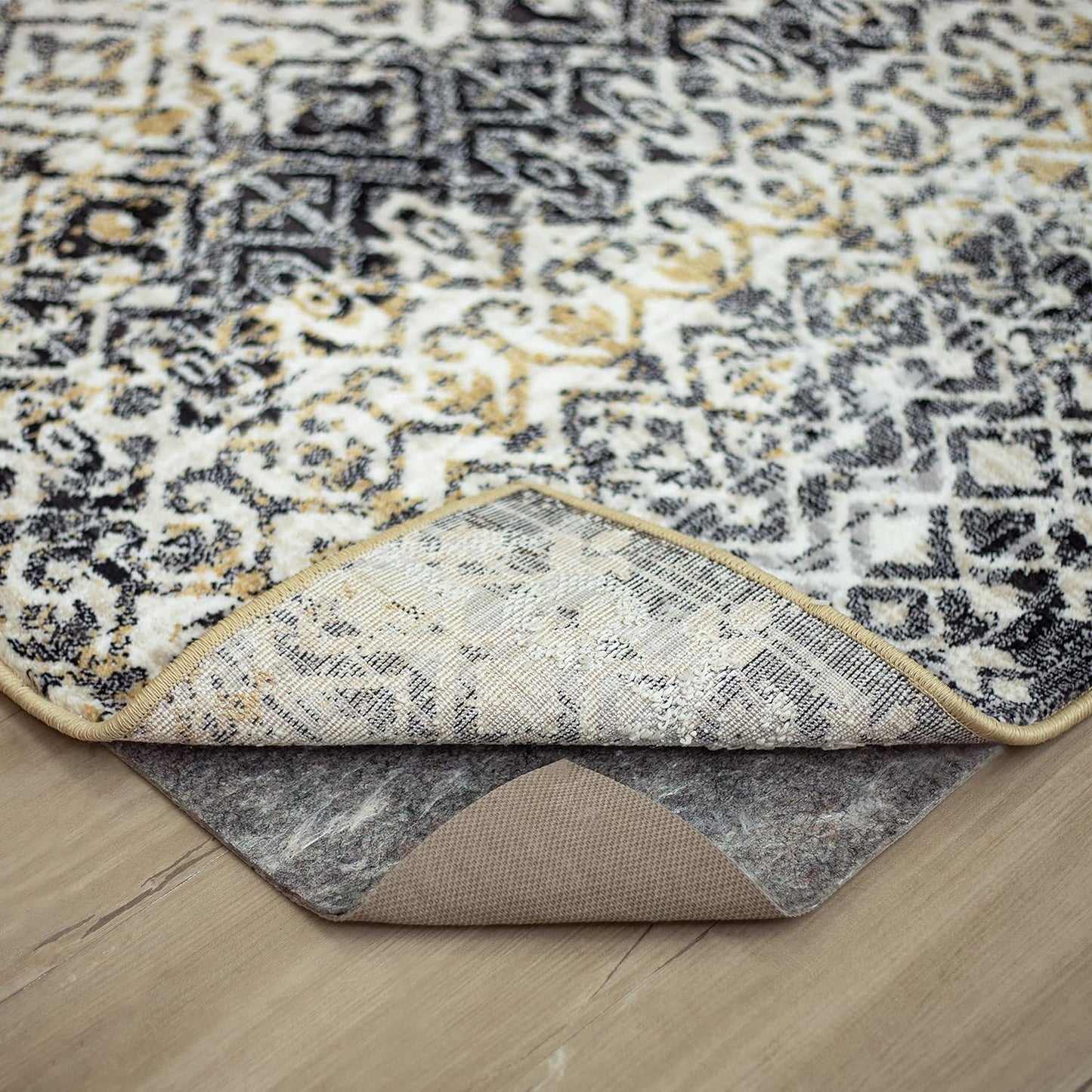 Mohawk Home 8' x 10' Non Slip Rug Pad Gripper 1/4 Thick Dual Surface Felt + Rubber Gripper - Safe for All Floors, Brown